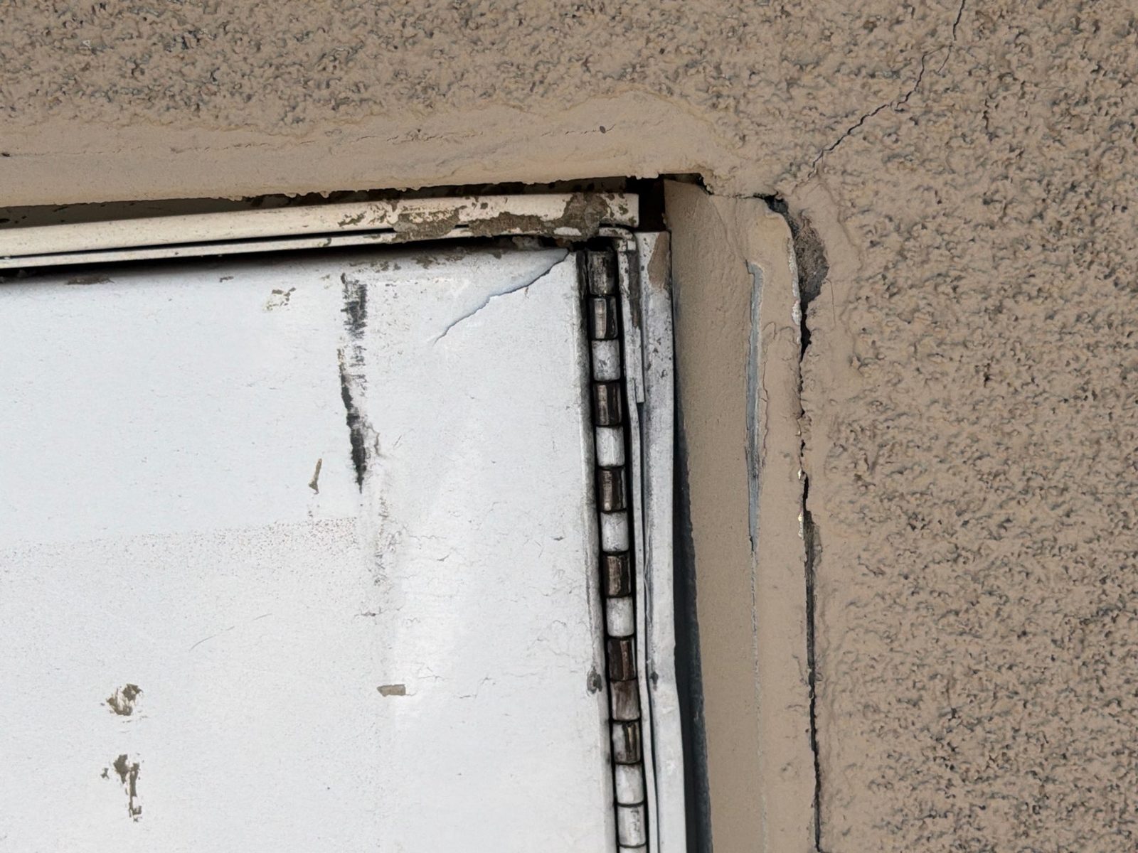 Failed parapet flashing found during a leak investigation