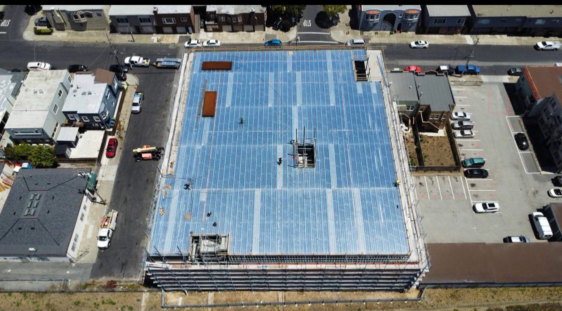 Aerial view of a completed commercial roof